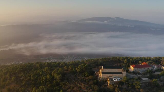 Aerial view over Mount Tavor and Church of the Transfiguration
Drone view from North Israel at sunrise , 2021
