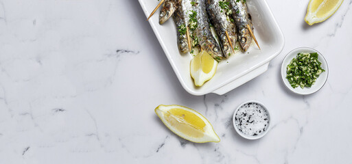 Homemade Grilled Sardines with Garlic, Olive Oil, Fresh Parsley, and Lemon