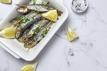 Homemade Grilled Sardines with Garlic, Olive Oil, Fresh Parsley, and Lemon