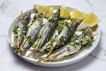 Homemade Grilled Sardines with Garlic, Olive Oil, Fresh Parsley, and Lemon
