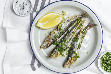 Homemade Grilled Sardines with Garlic, Olive Oil, Fresh Parsley, and Lemon