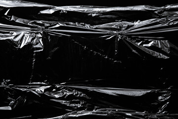 Pattern of the polyethylene wrap on black background