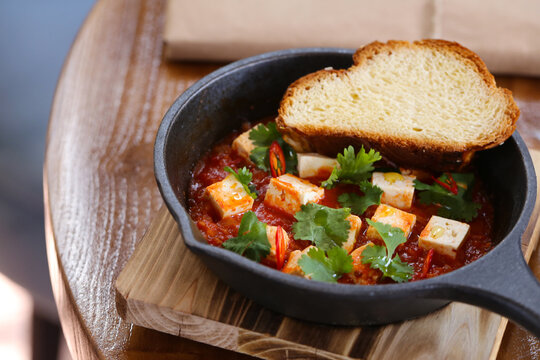 Tofu Cheese In Tomato Sauce In A Pan