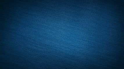 abstract blue woolen fabric texture may used as background with dark corners. vignette gradient blue fabric background for luxury concept. macro view of jean or denim texture background.