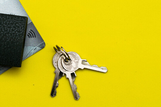 padlock with keys on a credit card on a yellow background data protection concept deposit protection