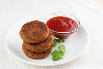 cutlets an asian starter made of vegetables bound with potato,Aloo Tikki