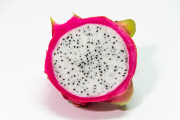 Dragon fruit cut in half isolated on white background.