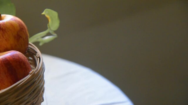 Bamboo baskets are full of tasty, nutritious and organic fruits like mangoes and apples.