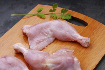 Raw  chicken whole leg_grey background