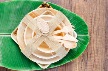 Kitchenware made from dried betel nut leaf palm, natural material.