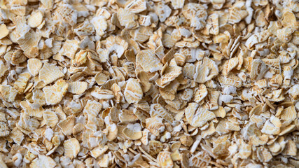 Oats flakes background. Oatmeal detail for packaging