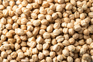 Raw organic chickpea texture background. Chick peas legume for packaging