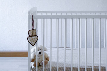 white baby bed. Waiting for a baby