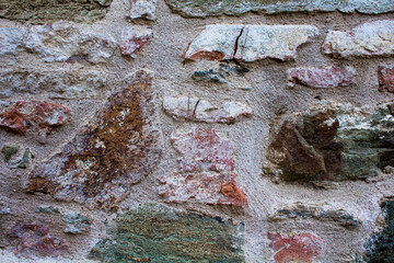 Close up view of old stone wall background.
