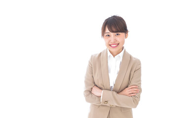 腕を組むビジネスウーマン