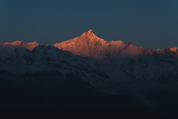 Fototapeta na wymiar Meili Snow Mountains Twilight and Sunrise, Yunnan Province, China