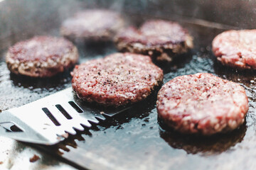 burgers on grill