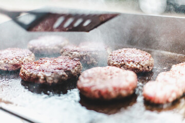 burgers on grill