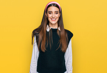 Fototapeta premium Young beautiful woman wearing casual white shirt with a happy and cool smile on face. lucky person.
