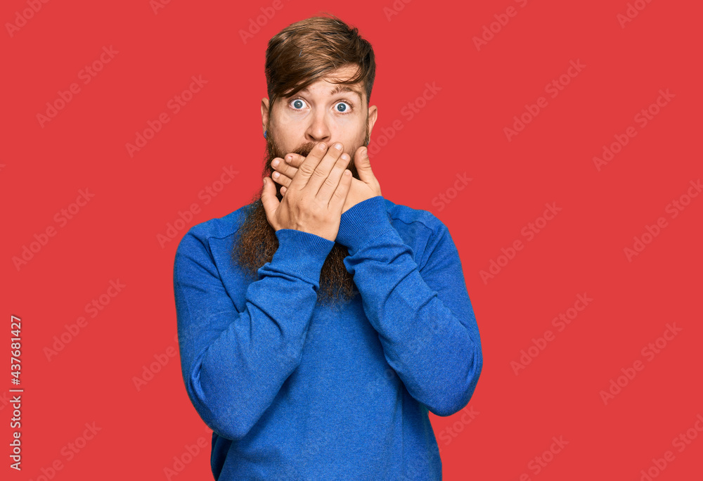 Poster young irish redhead man wearing casual clothes shocked covering mouth with hands for mistake. secret