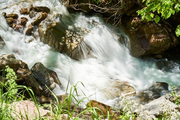 Waterfall in forest and mountain