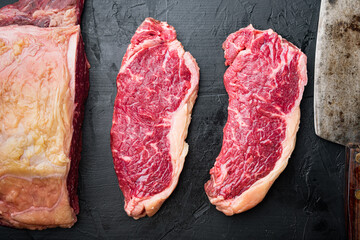 Veiny steak, marbled beef meat, on black background, top view