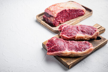 New York steak, raw beef meat , on white background, with copy space for text