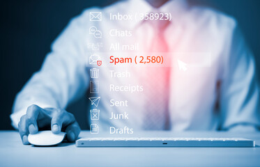 Email concept with laptop spam and virus computer monitor internet security concept, businessman reading electronic mail with a laptop. Spam, junk and e-marketing on-screen, Spam Email Pop-up Warning.