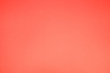 Red background. The texture of the cardboard.
