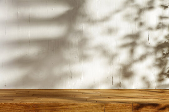 Desk of free space and wall with shadows 