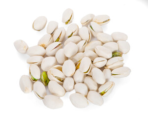 Salted Pistachio nuts in closeup isolated on white background