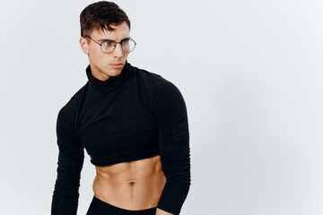 Fototapeta na wymiar portrait of a young guy with a pumped-up torso bodybuilder sweater 