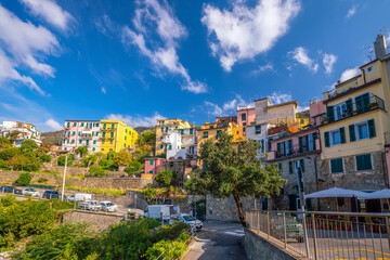 Fototapeta premium Corniglia, Colorful cityscape on the mountains over Mediterranean sea in Cinque Terre Italy