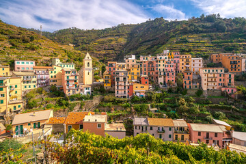 Fototapeta na wymiar Manarola, Colorful cityscape on the mountains over Mediterranean sea in Cinque Terre Italy