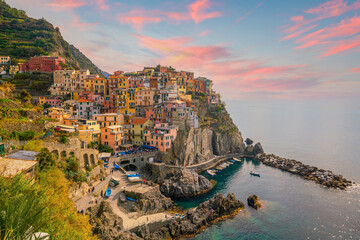 Obraz na płótnie Canvas Manarola, Colorful cityscape on the mountains over Mediterranean sea in Cinque Terre Italy