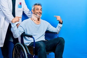 Handsome middle age man with grey hair on wheelchair wearing cervical collar looking confident with...