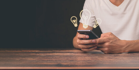 icon light bulb concept find new ideas via smartphone