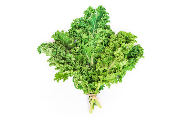 Kale leaves vegetable isolated on white background. Kale is considered a superfood because it's a great source of vitamins and minerals. Top view.