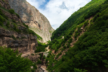 Fototapeta na wymiar The road in the mountain gorge