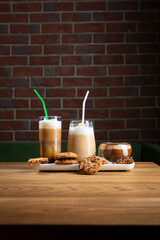 Cold coffee beverages set on wooden table