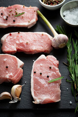 Close up of raw meat on slate
