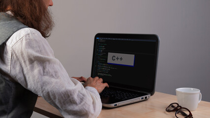Write code and learn programming languages. Development in C plus plus. - obrazy, fototapety, plakaty