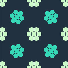 Green and beige Honeycomb icon isolated seamless pattern on blue background. Honey cells symbol. Sweet natural food. Vector
