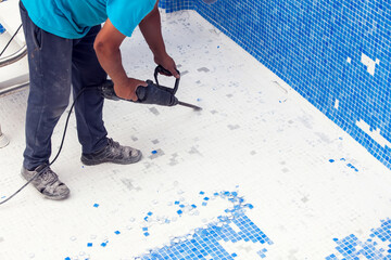 Removing tile in the pool, renovation work