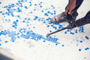 Removing tile in the pool, renovation work