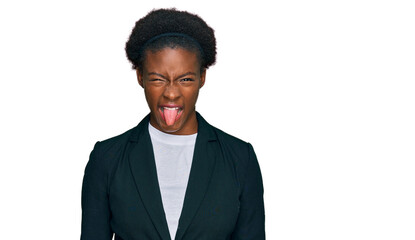 Young african american girl wearing business clothes sticking tongue out happy with funny expression. emotion concept.