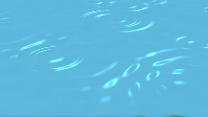 Ripples of rain spreading on the surface of the water