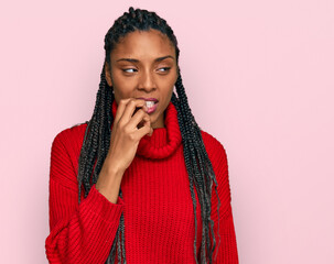 African american woman wearing casual winter sweater looking stressed and nervous with hands on...
