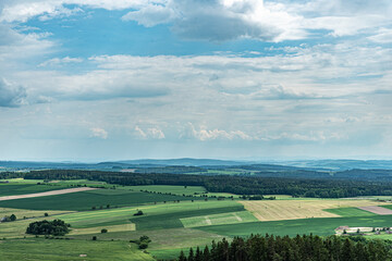 Obraz premium Cloudy sky in Czech Republic with colorful fields