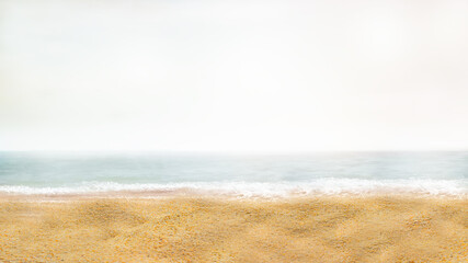 Fototapeta na wymiar Beach near the sea with a defocused background